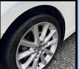 Clean glossy alloy wheel after detailing